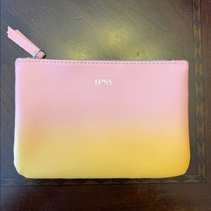 Ipsy pink/yellow ombré cosmetic bag. New without tag
